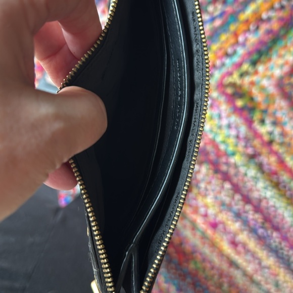 Michael Kore Black Wristlet with Gold Grommet Accents - Picture 5 of 5